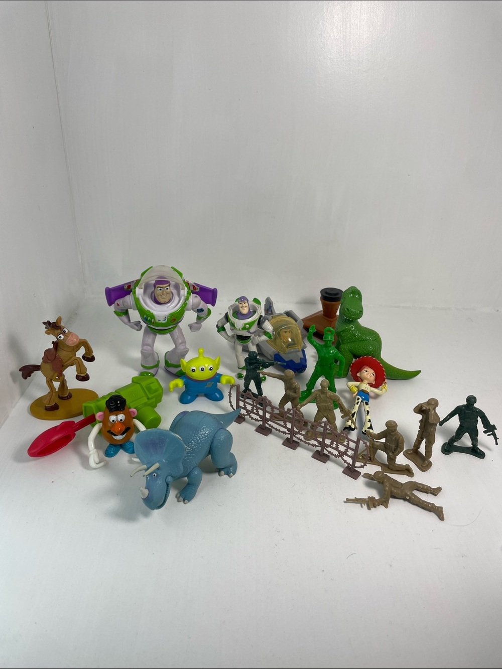 Assortment of Pixar Toy Story Figures / cake toppers.